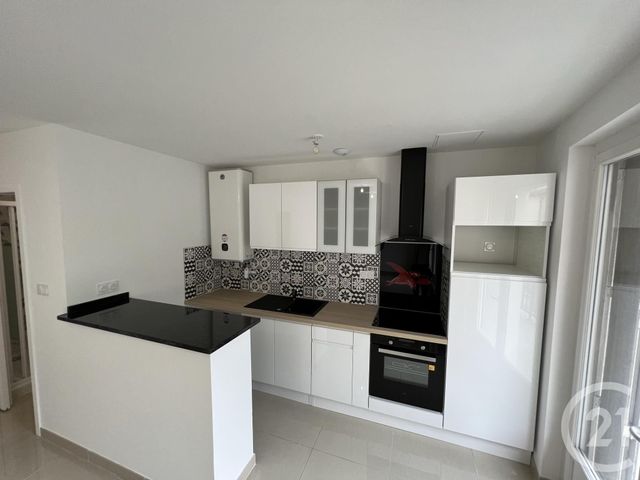 Appartement T2 à louer - 2 pièces - 41.35 m2 - FOIX - 09 - MIDI-PYRENEES - Century 21 L'Agence